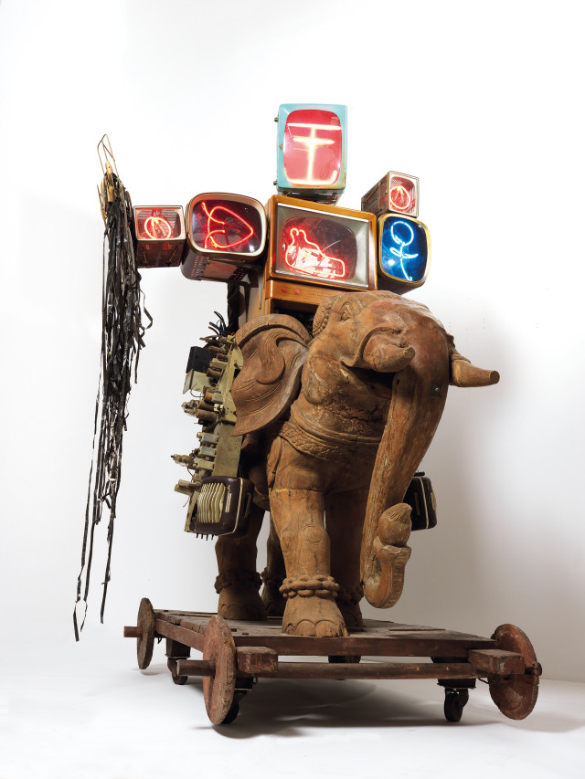 Nam June Paik, ‘Alexander the Great,’ 1993, mixed media, TV monitors, neon lights, wooden sculpture. Image courtesy Christie’s Images Ltd.