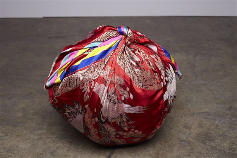 Kimsooja, Bottari (2011). Used Korean bedcovers, used clothing of artist’s son, 48.3 x 50.8 x 50.8 cm. Courtesy of Kimsooja Studio. Image provided by Kukje Gallery.