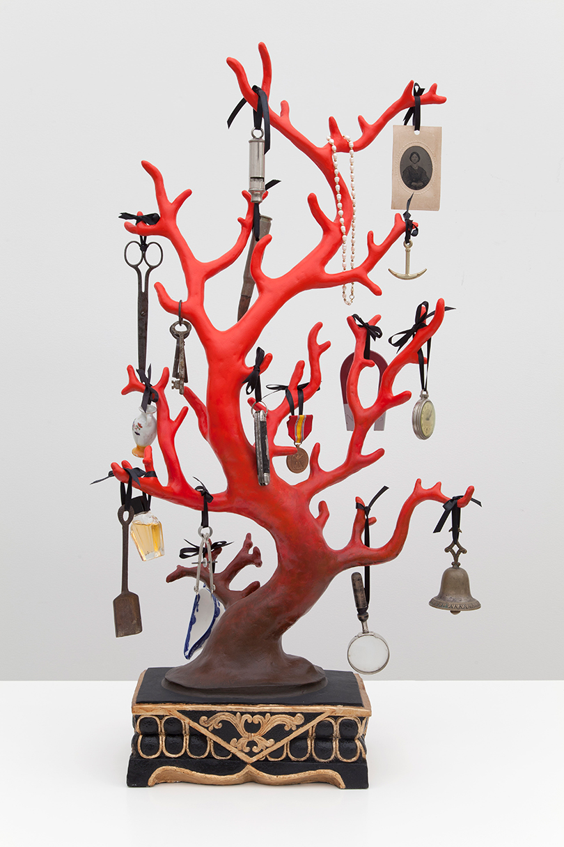 Mark Dion, Blood Coral (2019). Cast resin and assorted items on wooden crate. 207 x 67.3 x 43.2 cm. Courtesy Barakat Contemporary