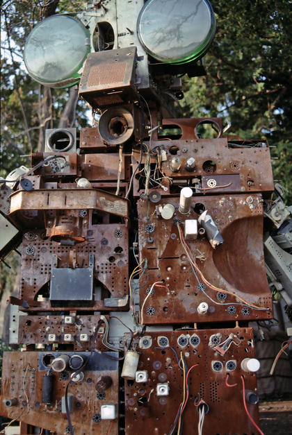 NAM JUNE PAIK, Tangun as Scythian King (detail), 1993, welded steel framework with old television chassis and picture tubes, neon, large brass mail box and metal pole staff with speakers, dimensions variable.