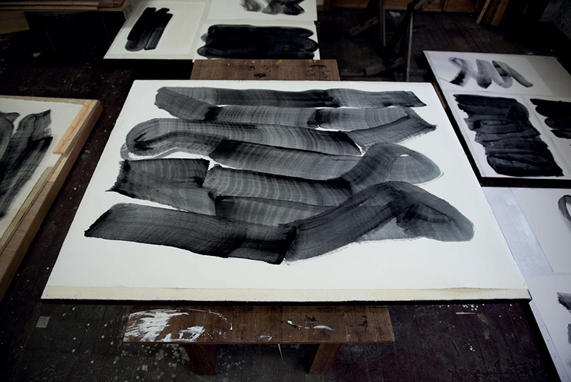 Process shot of Lee’s charcoal on paper works from a new series entitled Dessin